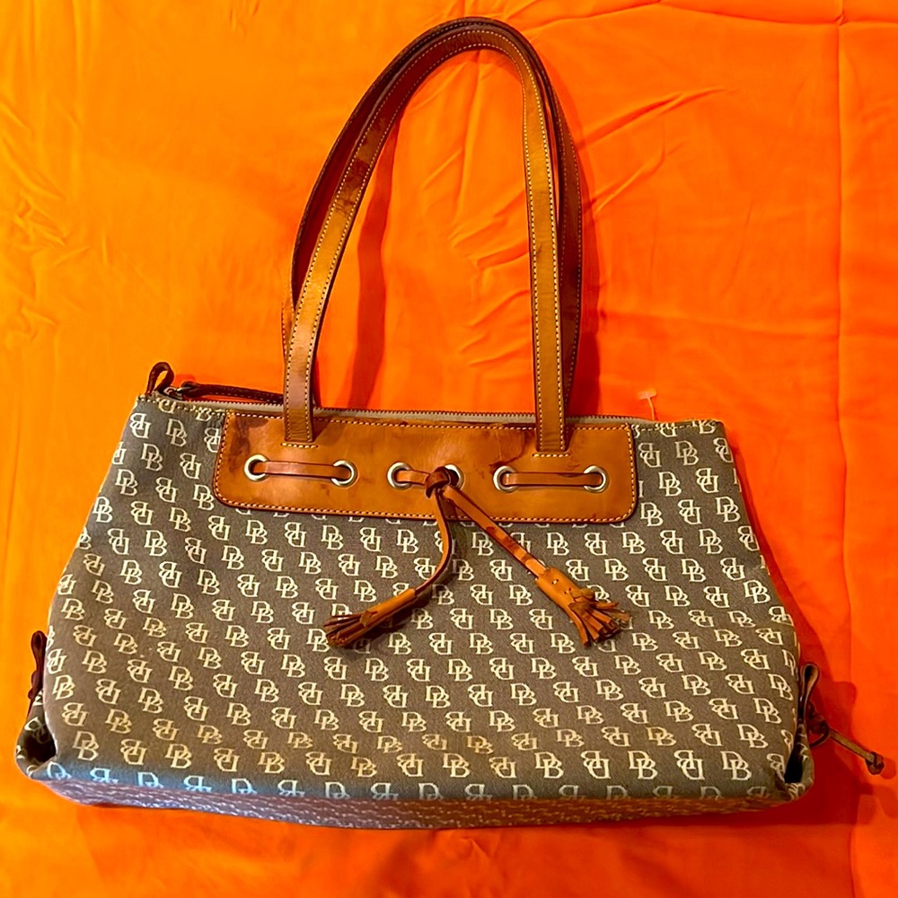 Dooney and Bourke shoulder bag, leather straps have oil, barely worn